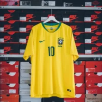 hanging yellow and green Nike soccer jersey shirt